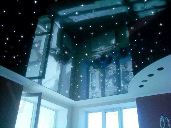 Stretch ceiling starry sky in bedroom
